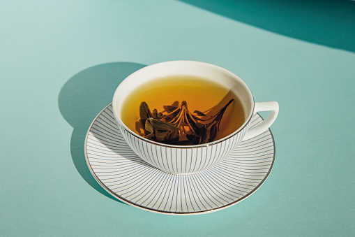 Herbal tea in a white cup.