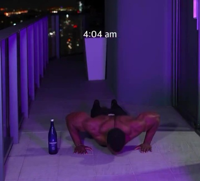 Ashton Hall working out on his balcony at four in the morning.